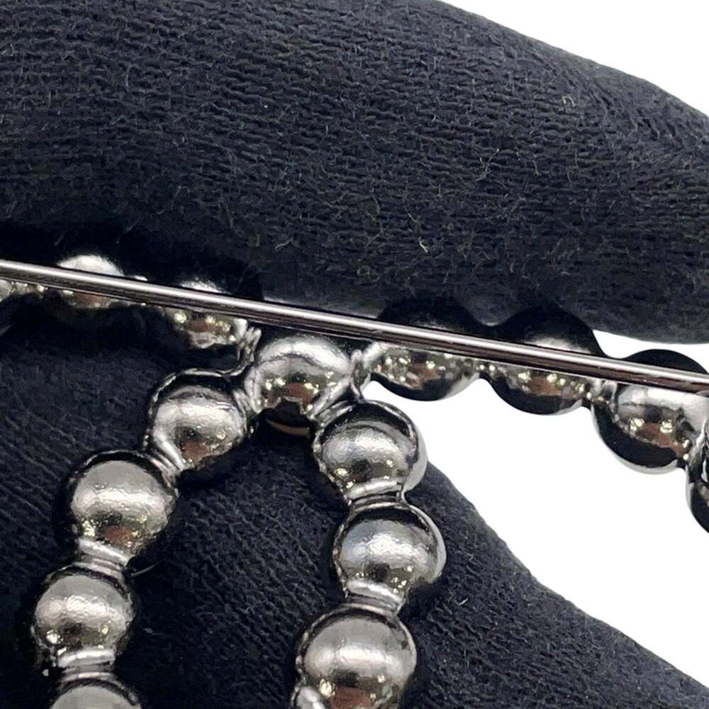 CHANEL Black Pearl Logo Brooch - Picture 6 of 10
